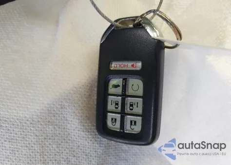 2021 Honda Odyssey Touring z USA, uszkodzony, nr VIN 5FNRL6H8XMB006701